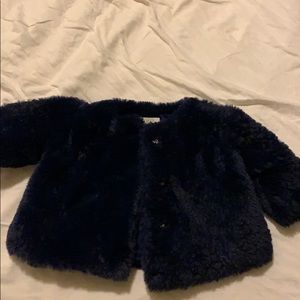 A dark blue coat for baby